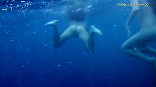 Hot erotics in the sea with 3 girls
