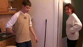Catches stepson in kitchen